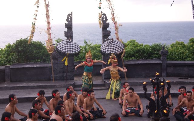 Kecak dance performance with Rama and Sita dancers in the open-air amphitheatre at Uluwatu above the ocean