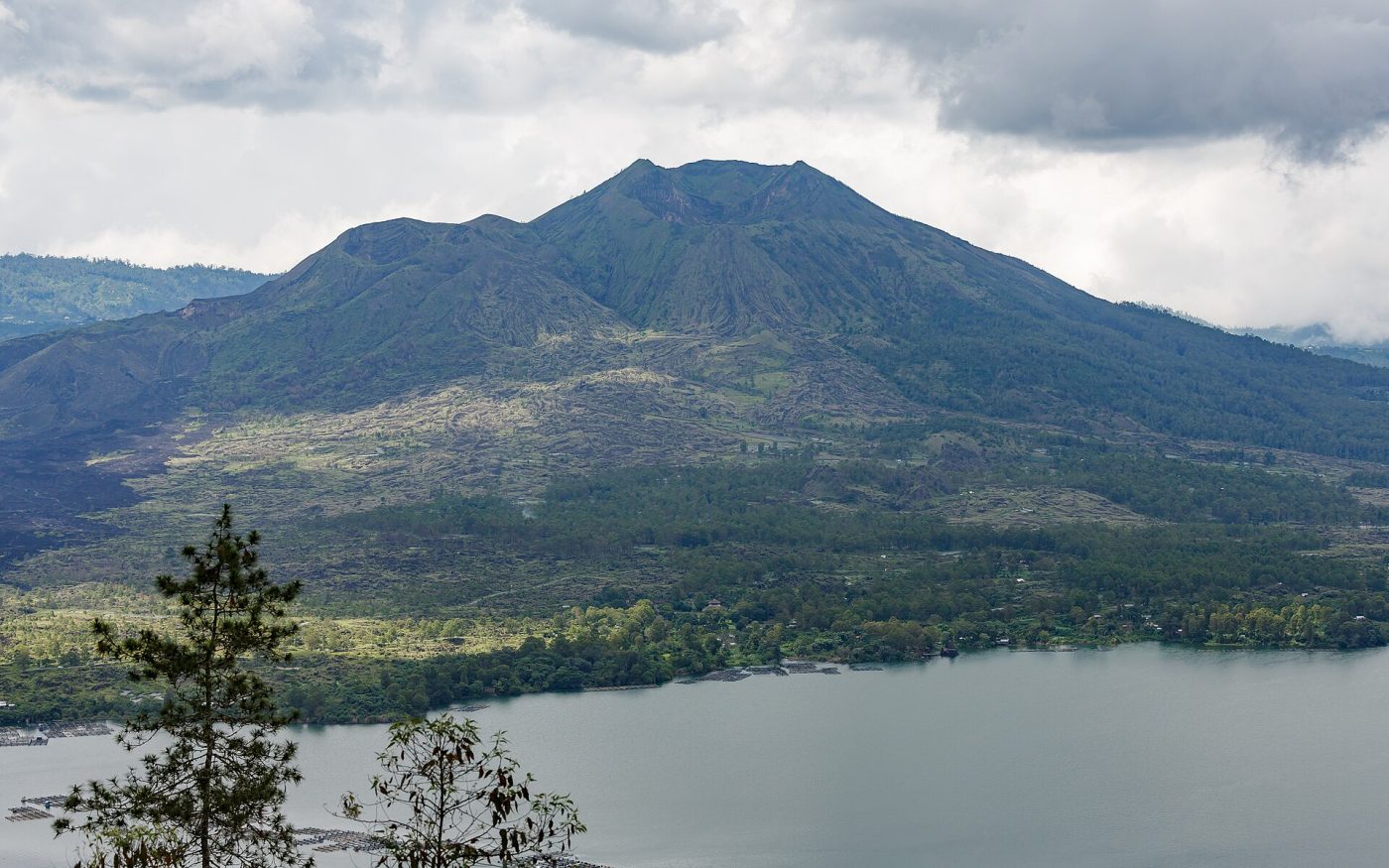 Mount Batur volcano rising above Lake Batur in the Kintamani highlands