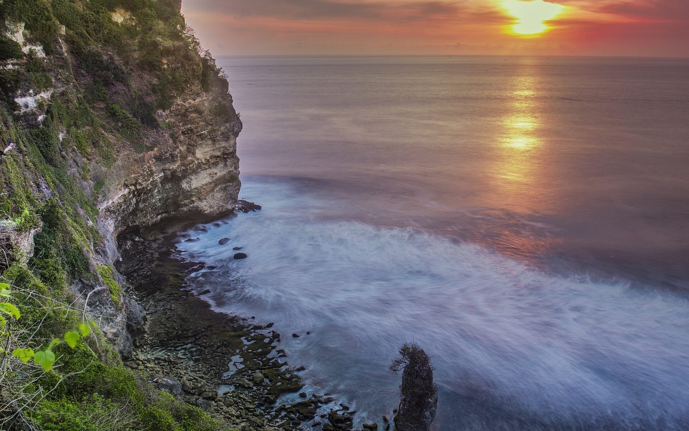 Sunset over the Indian Ocean from the cliffs of Uluwatu Temple, Bali